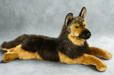 Studio view of German Shepherd weighted plush in relaxed laying position, full body, long coat and lifelike features. 40", Up to 24 lbs, deep pressure sensory companion.