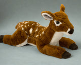 Weighted deer fawn plush in low-profile laying pose, ultra-soft brown coat with white spots, 22 inches.
