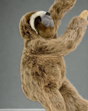 Side angle of 21-inch weighted sloth showing chubby belly, soft brown and tan fur, and long arms; cozy calming plush.