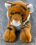 Front view of 19-inch weighted tiger plush with paws forward; plush stripes and floppy pose for cozy hugs.
