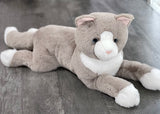 32-inch weighted gray and white cat plush in a floppy lay-down pose on a wood floor