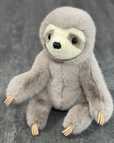 Sitting view of 16-inch “Super Soft” weighted sloth plush; velvety light-gray fur, cream face mask, gentle eyes; calming stuffed animal up to 4 lbs.