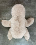Top/back view of weighted sloth with arms and legs out showing flat laying position. 16-inch super-soft texture.