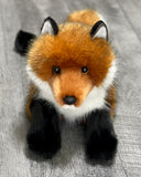 Front view of lifelike weighted red fox sensory plush with soft muzzle and bright eyes.