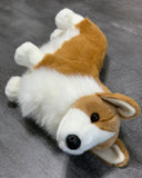 Close three-quarter view of 20-inch weighted Corgi plush on its side; ultra-soft fur and black nose.