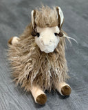 Front view close up of 15-inch weighted llama plush with shaggy tan fleece, long lashes, and floppy legs in a relaxed laying pose.