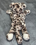 Back view of weighted leopard plush highlighting all-over rosette pattern and long tail; plush, cuddly texture.