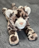 Front view of weighted leopard plush with soft muzzle and pink nose; ultra-soft spotted fur in a laying pose.