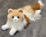 Lifelike weighted Ragdoll cat stuffed animal in laying pose, long fluffy tail, 15 inches.