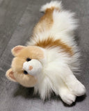Weighted Ragdoll cat plush lying down—cream and caramel fur, 15 inches.