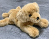 Three-quarter view of 19-inch weighted Golden Retriever plush; floppy paws and ultra-soft fur for soothing comfort.