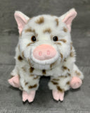 Front portrait of 17-inch weighted spotted pig plush with pink snout and dappled coat; ultra-soft calming stuffed animal.