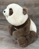 Side view of the 24-inch adjustable weighted panda plush showing its rounded body and ultra-soft faux fur.