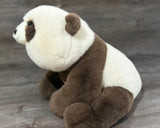 Rear side view of the 24-inch adjustable weighted panda plush showing its soft, huggable shape and premium faux fur.