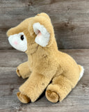 Side view of weighted fawn plush showing soft tan fur and floppy sitting pose