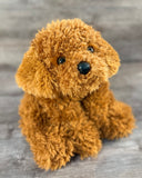 22-inch weighted Cockapoo plush with curly brown fur, floppy ears, and lifelike face, available up to 7 lbs for calming sensory comfort.