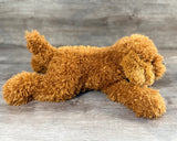 Side view of a 22-inch weighted Cockapoo plush featuring fluffy curly doodle-style fur, floppy body, and full-body weighted design up to 7 lbs.