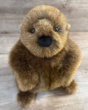 Front view of weighted beaver plush with rounded face and ultra-soft brown plush.