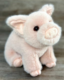 Weighted pink pig plush stuffed animal with super-soft plush fur and sweet face