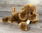 Chocolate Labradoodle weighted stuffed dog laying down with silky soft plush fur