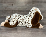 Side view of a soft weighted goat plush measuring 23 inches with a relaxed laying pose.