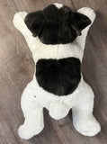 Top view of weighted Frenchton plush with full-body weighting and ultra-soft black and white coat