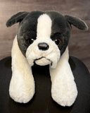 Weighted French Bulldog stuffed animal resting on a lap for calming sensory comfort