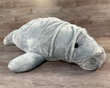 Angled view of the 32-inch weighted Mama Manatee plush with ultra-soft faux fur and broad lap-friendly shape