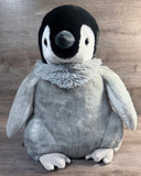 20-inch gray weighted baby penguin plush with black and white face, fluffy neck feathers, floppy wings, and rounded body.